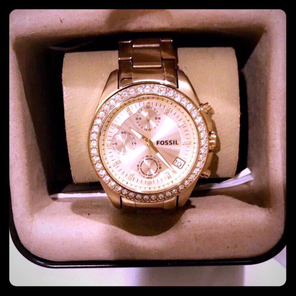 Gold fossil watch
